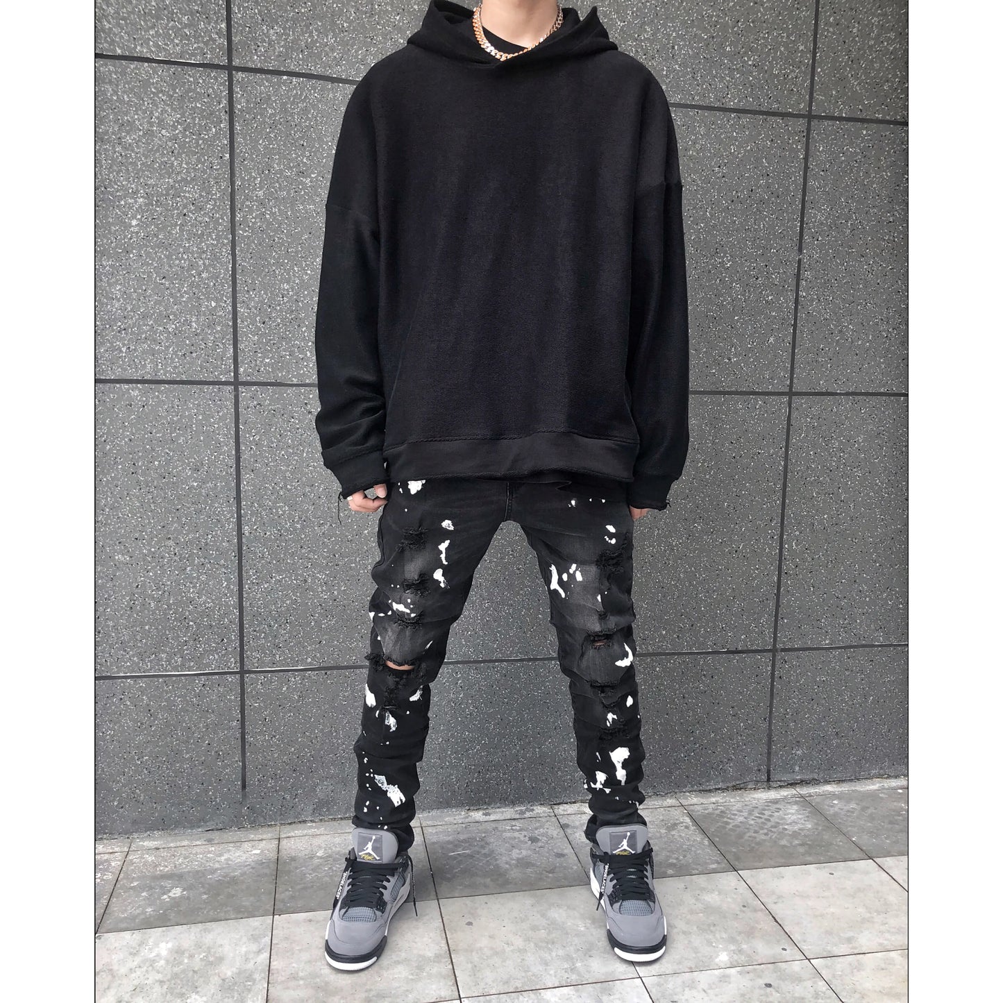 Men's Black Distressed Stretch Denim Jeans with Paint Splatter